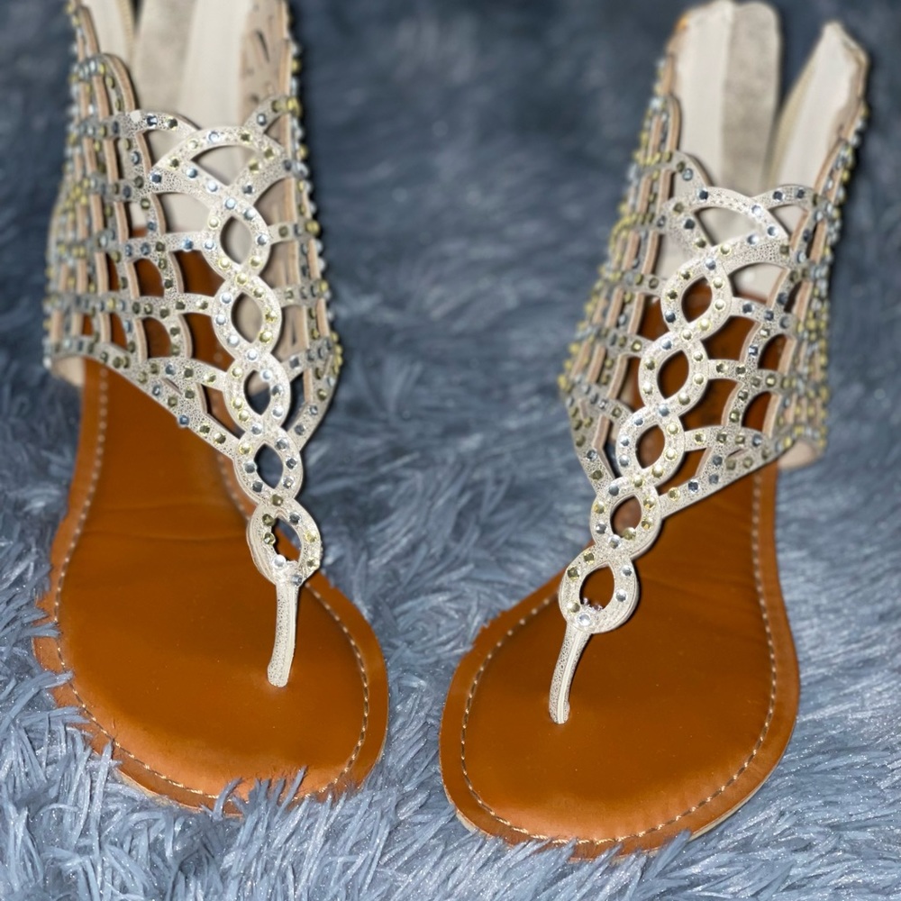 Sandals with diamonds on them,never been worn and in great condition.